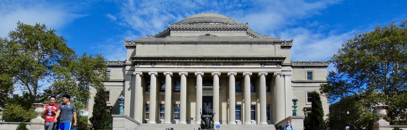 Students walk in front of Low Memorial Library at Columbia University